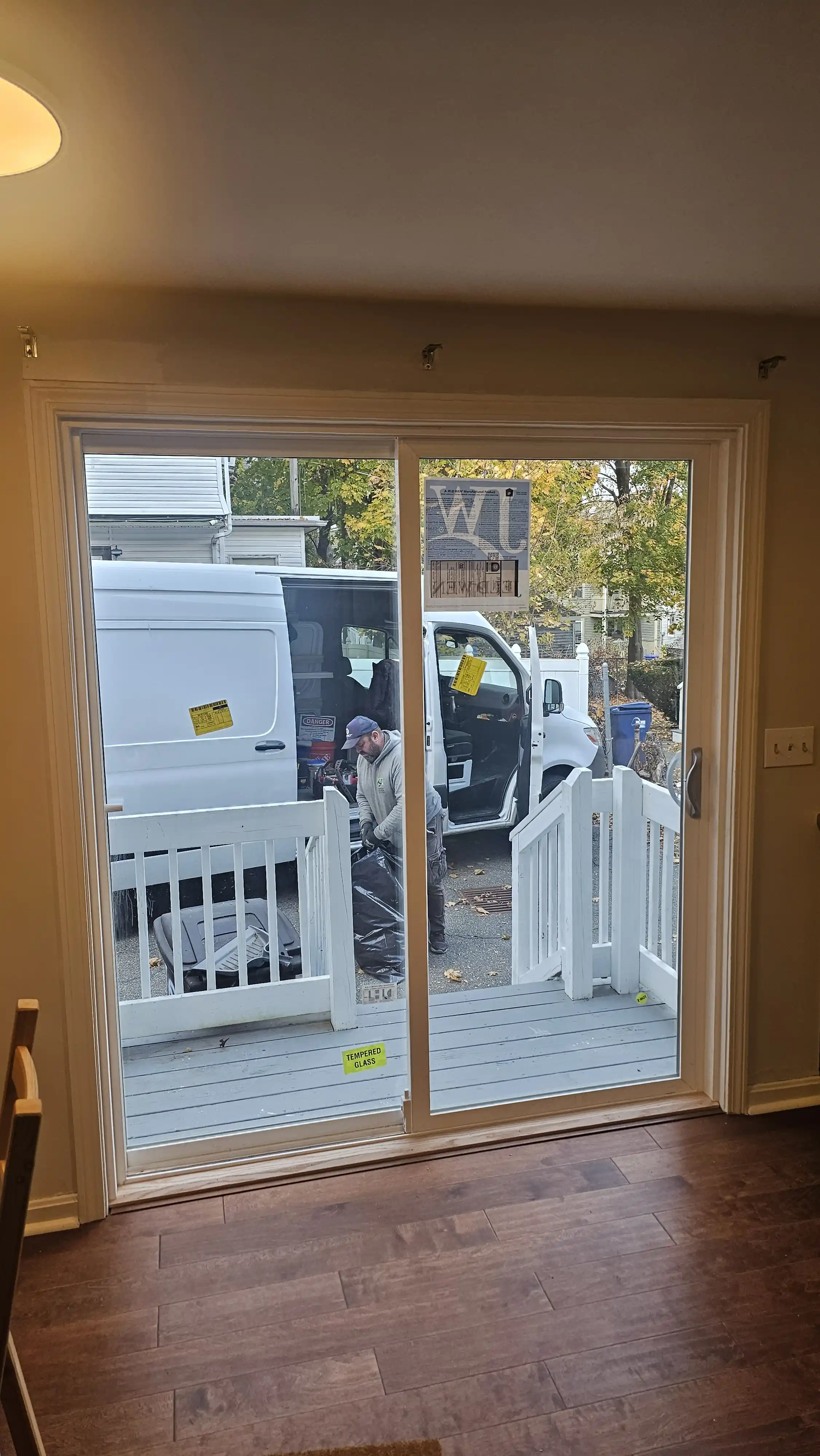 Large two-panel patio door with tempered glass and full-length sliding screen